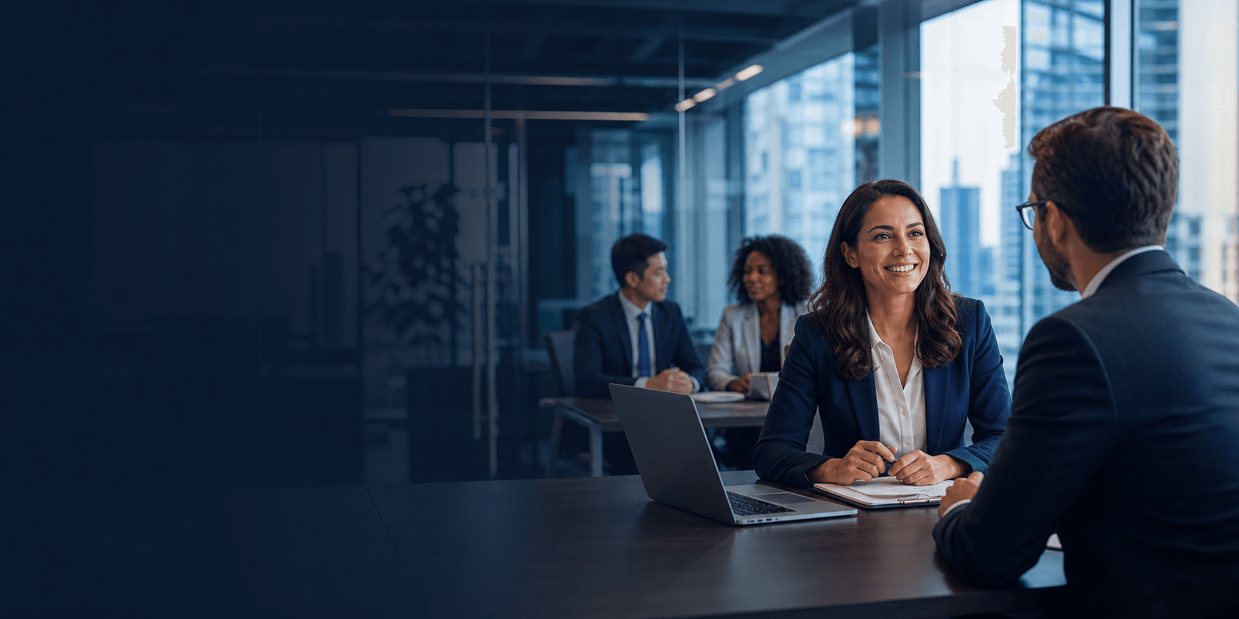 Recruiter interviewing a candidate in a modern international office